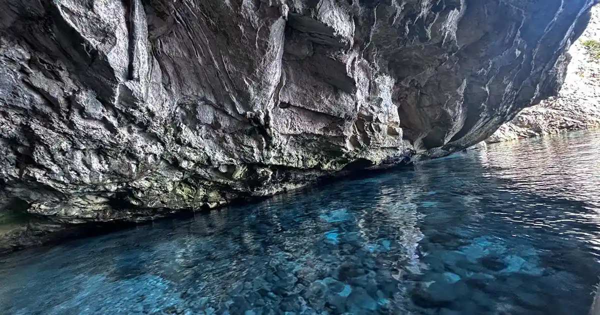 Secluded limestone cove on the Karaburun Peninsula accessible only by boat, Vlore Albania